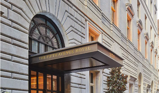 Elegant exterior entrance of The Fifth Avenue Hotel in Manhattan, New York City