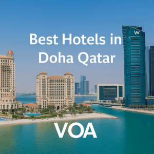 Doha skyline featuring the St. Regis resorts and W Doha Hotel along the Arabian Gulf with text overlay reading "Best Hotels in Doha Qatar – VOA.