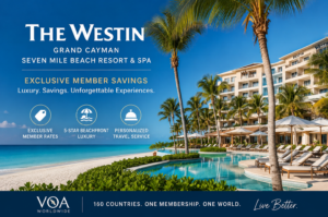 Luxury beachfront view of The Westin Grand Cayman Seven Mile Beach Resort & Spa featuring the ocean, palm trees, resort pool, and exclusive VOA Worldwide member savings at one of the Cayman Islands' premier five-star resorts.